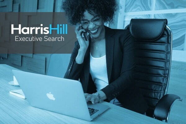 Female executive on phone call at desk